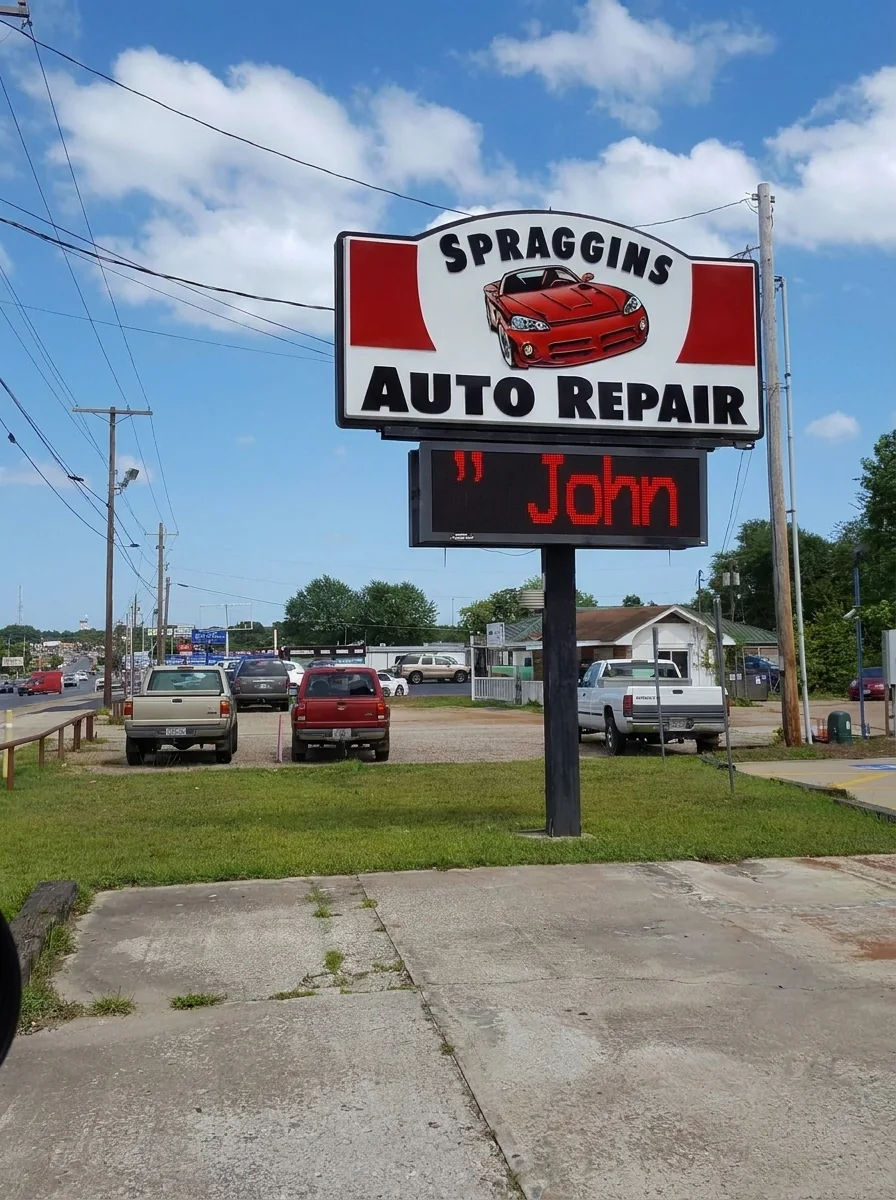 Spraggins Auto Repair roadside sign in Longview